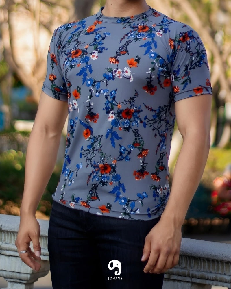 PLAYERA CUELLO REDONDO ESTAMPADO FLORES NARANJA FONDO GRIS