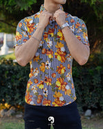 Cargar imagen en el visor de la galería, CAMISA MANGA CORTA ESTAMPADA PIXELES Y FLORES AMARILLAS
