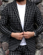 Cargar imagen en el visor de la galería, BLAZER SOLAPA V CASUAL NEGRO CON CUADROS  BLANCOS
